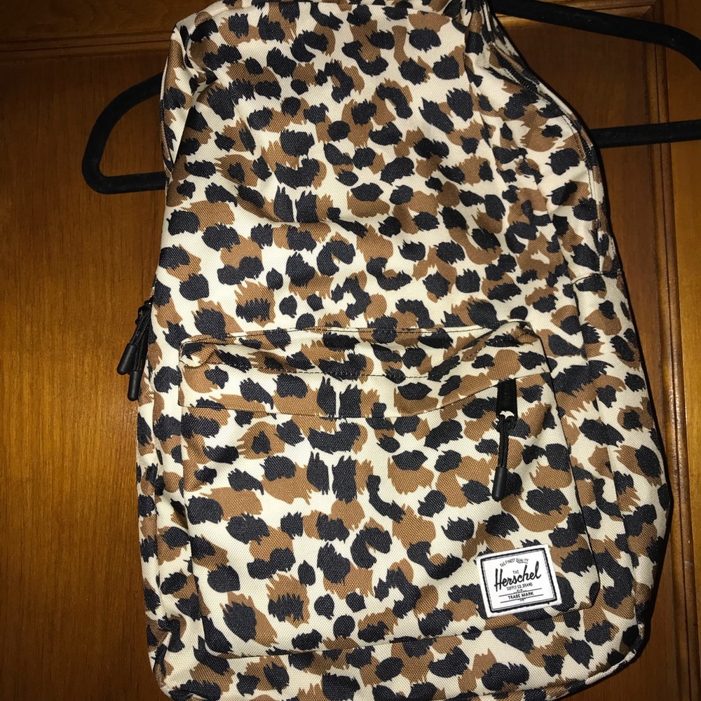 leopard print Hershel backpack. Never used.
